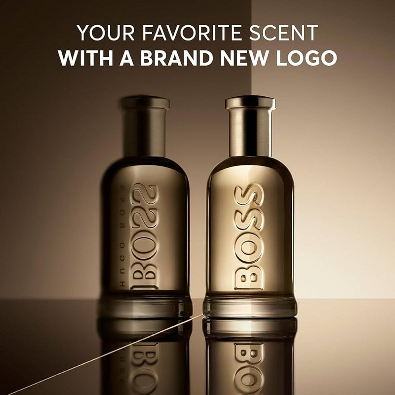 Two BOSS bottles on a reflective surface with text about a new logo.