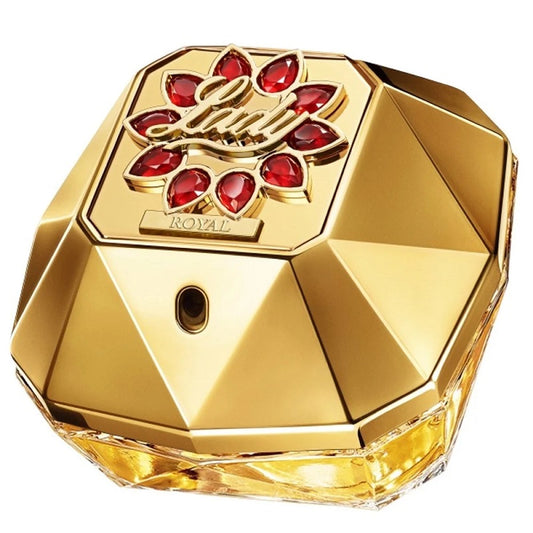Gold perfume bottle with red gemstones on a white background