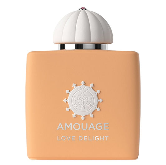 A bottle of Amouage Love Delight Eau de Parfum with a peach-colored body and a white cap featuring the Amouage brand logo.