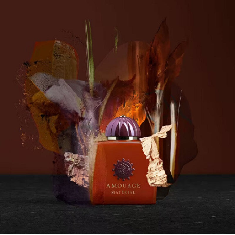 Red Amouage perfume bottle with purple cap on a dark background