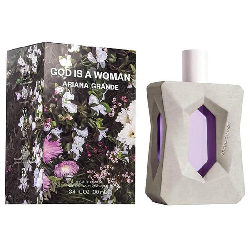 Ariana Grande 'God is a Woman' perfume bottle and packaging with floral design.