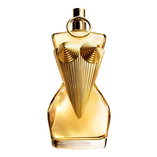 A bottle of Divine Woman Eau de Parfum by Jean Paul Gaultier with a gold-colored design and a stylized representation of a woman's face and body.