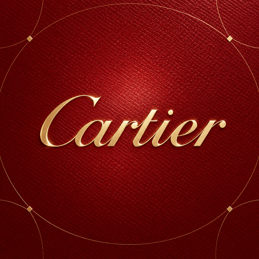 Champagne gold Cartier logo on a deep red luxury jewellery inspired background