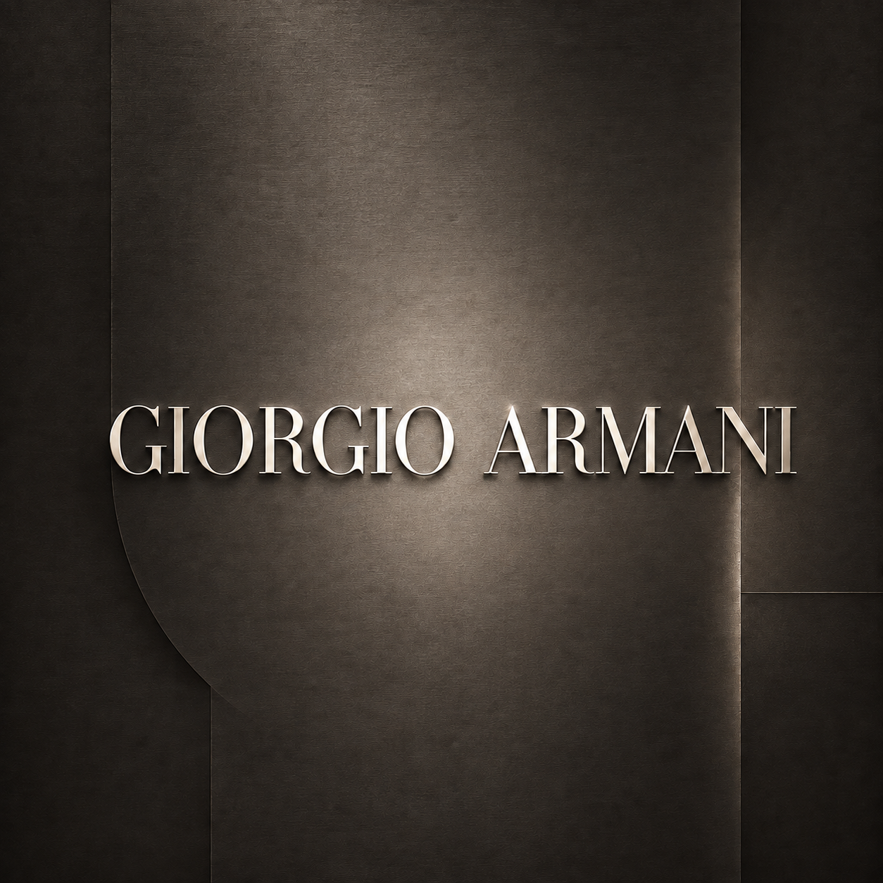 Metallic Giorgio Armani logo on a deep warm greige architectural background