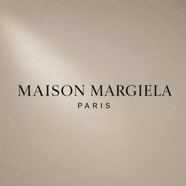 Maison Margiela fragrance house logo on a clean neutral background
