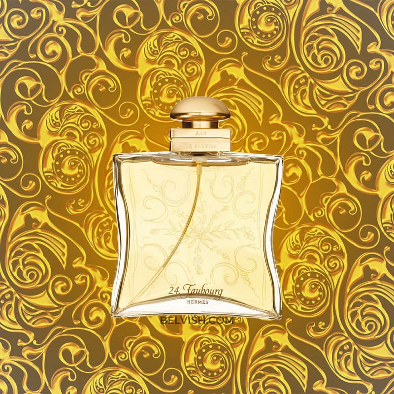 Perfume bottle with gold and white design on a decorative gold background