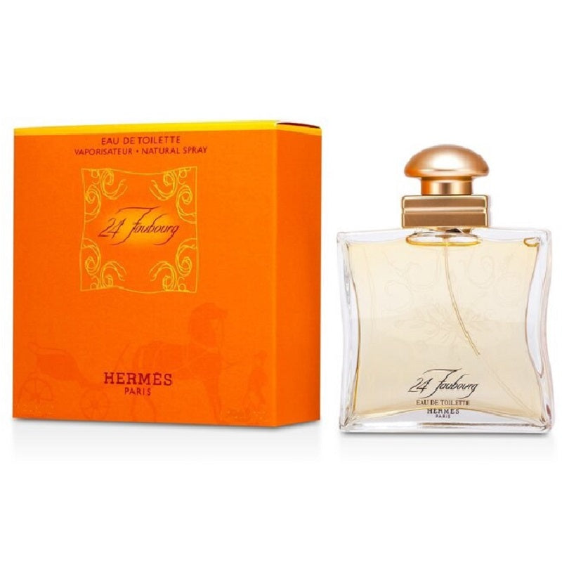Hermes perfume bottle and packaging on a white background