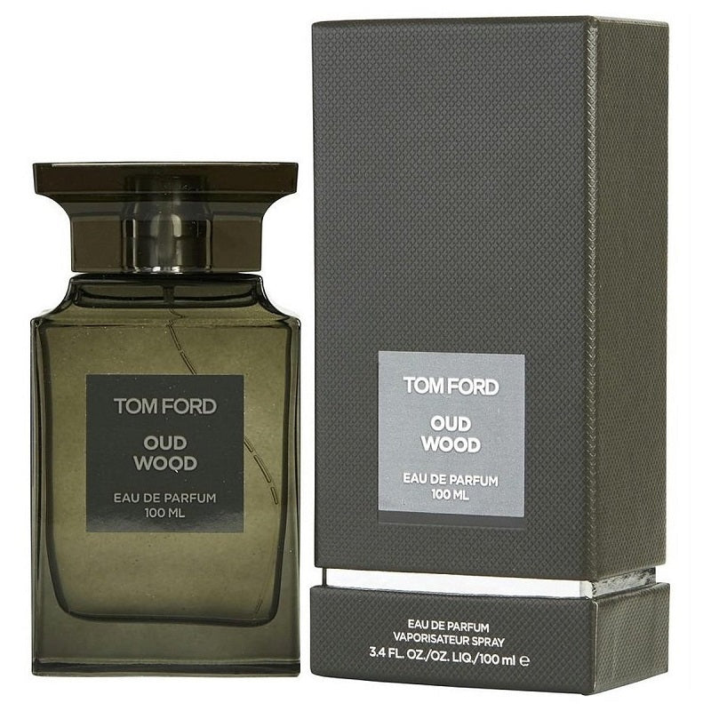 Tom Ford Oud Wood Eau de Parfum in a 100ml bottle with packaging, showcasing the product with a dark green liquid inside.