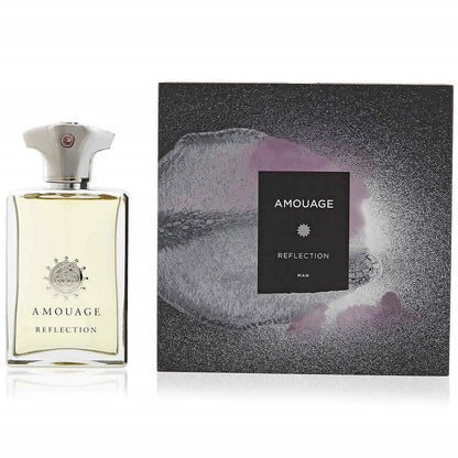 A bottle of Amouage Reflection Man Eau De Parfum next to its packaging box.