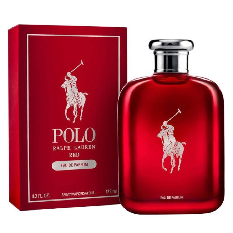 A bottle of Polo Red Eau De Parfum by Ralph Lauren, with a red hue and a white graphic of a polo player on the front, alongside its packaging box.