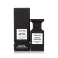 A black bottle of Tom Ford 'Fucking Fabulous' Eau de Parfum with its packaging box, both featuring white label text.