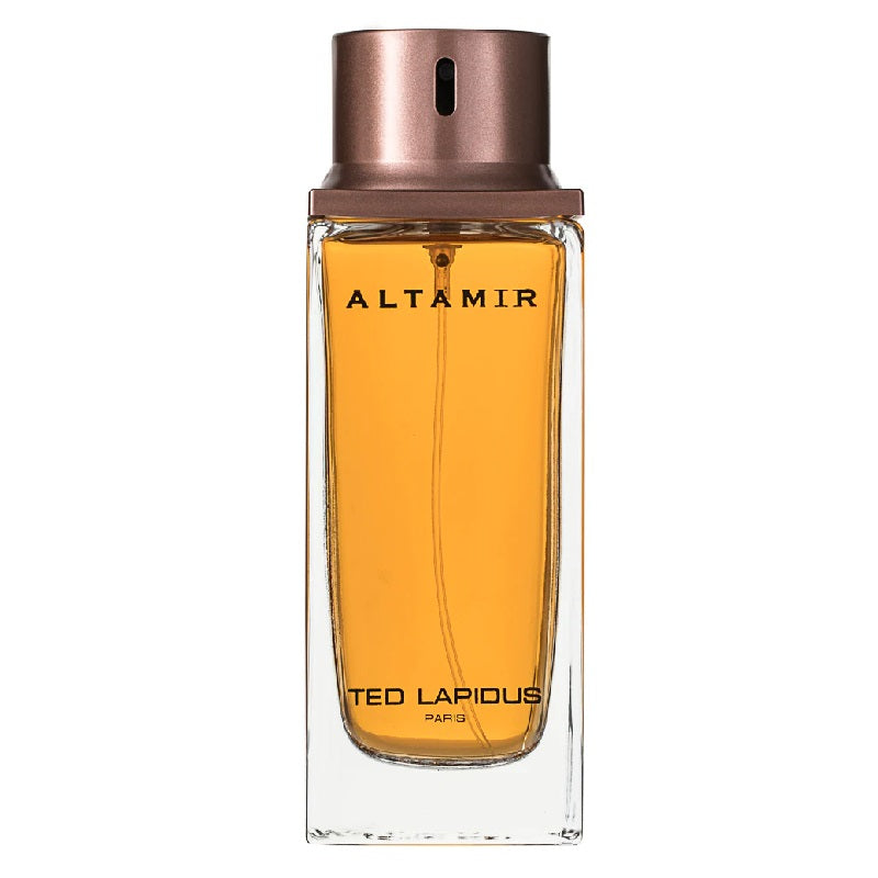 Perfume bottle with bronze cap and amber liquid on a white background