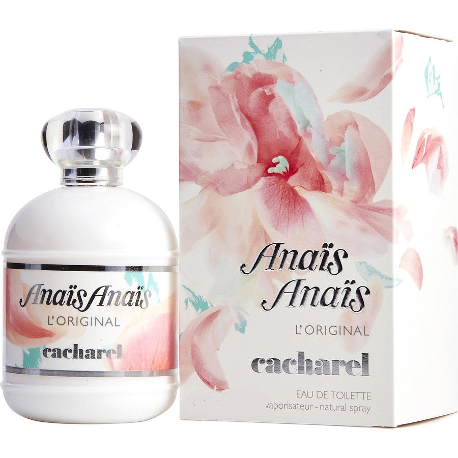 A bottle of Anais Anais L'Original Eau de Toilette by Cacharel, with a white label and a floral design. The product is displayed alongside its packaging box.