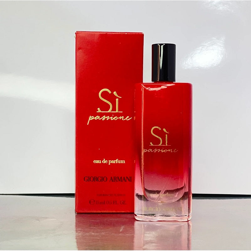 Red Giorgio Armani Si Passione perfume bottle and packaging on a white background