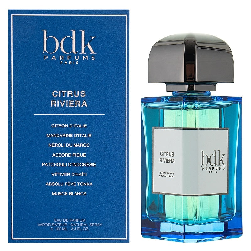 The image shows a perfume bottle and box for Citrus Riviera by BDK Parfums. The bottle is blue with a black cap, and the box is blue with white text displaying the perfume name and notes.