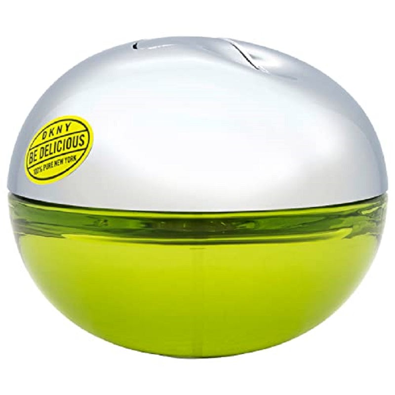 Green perfume bottle with silver cap on a white background