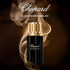 Chopard Black Incense Malaki perfume bottle with smoke effect on a dark background