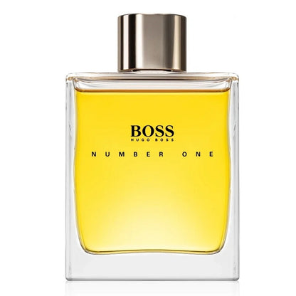 Hugo Boss Number One perfume bottle with yellow liquid on a white background