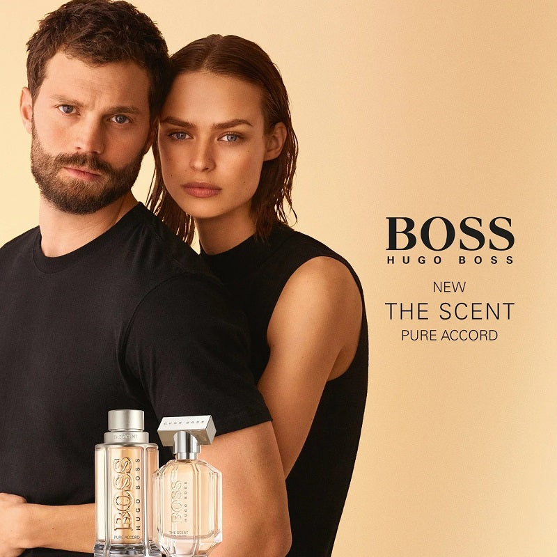 Lifestyle Image: Man wearing Hugo Boss The Scent Pure Accord in a bright, modern setting