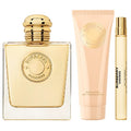 Burberry Goddess perfume set with a bottle, lotion, and rollerball on a white background