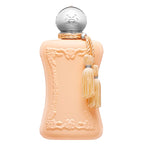 A peach-colored, ornate bottle of Cassili Eau de Parfum by Parfums De Marly with a silver cap and a gold tassel.