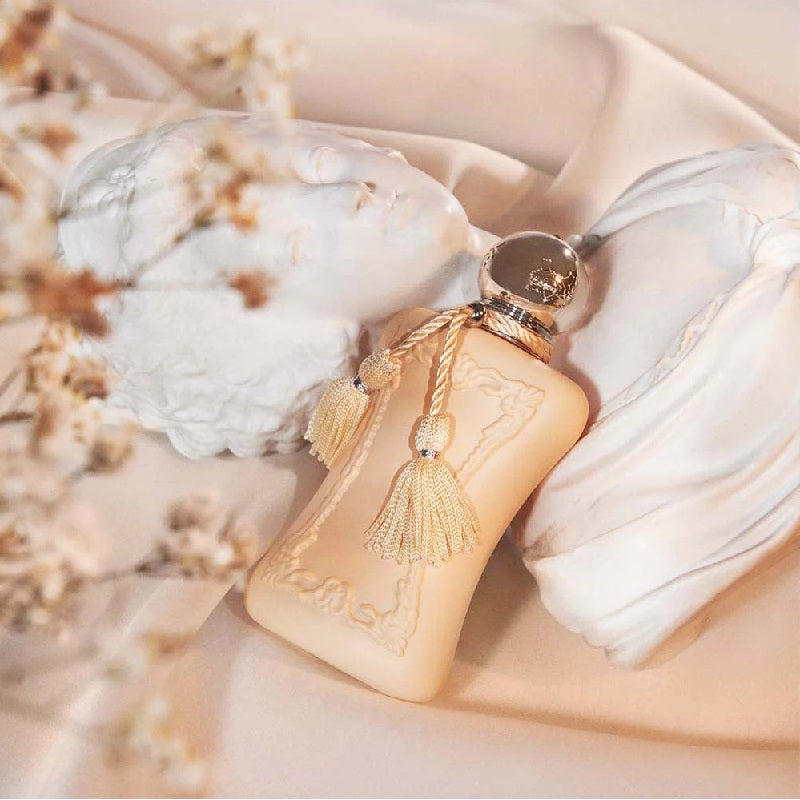 Lifestyle Image: Cassili 75 ml Eau de Parfum by Parfums de Marly – styled in a graceful, sunlit setting evoking joy, softness, and contemporary Parisian allure