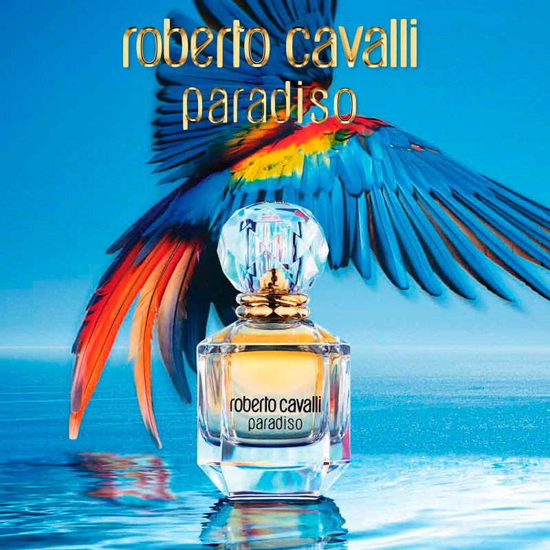 Roberto Cavalli Paradiso perfume bottle with a colorful parrot in the background