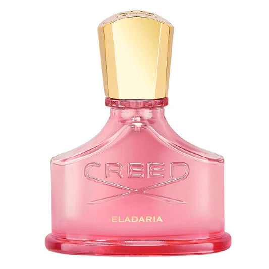 Pink Creed Eladaria perfume bottle with gold cap on a white background