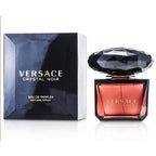 Versace Crystal Noir perfume bottle and packaging on a white background