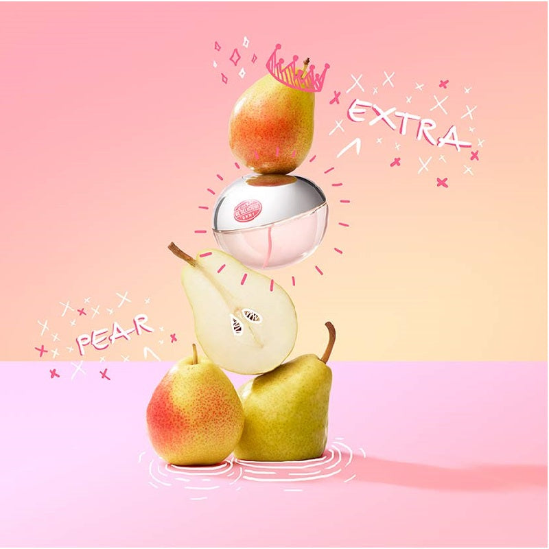 Stack of pears with a reflective surface and 'Extra' text on a pink background
