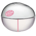 DKNY Extra Be Delicious perfume bottle on a white background