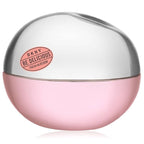 Pink and silver DKNY Be Delicious Fresh Blossom perfume bottle on a white background