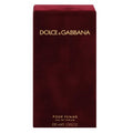 A red bottle of Dolce Pour Femme Eau de Parfum by Dolce & Gabbana with a gold cap and branding details.