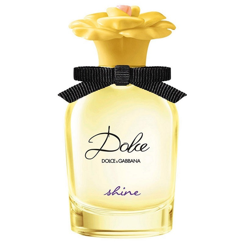 Dolce & Gabbana perfume bottle with yellow cap and clear body on a white background