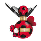 A bottle of Marc Jacobs Dot Eau de Parfum with a red and black design, featuring a ladybug motif and decorative gold elements.