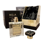 Roja Parfums Elysium perfume bottle with packaging on a white background
