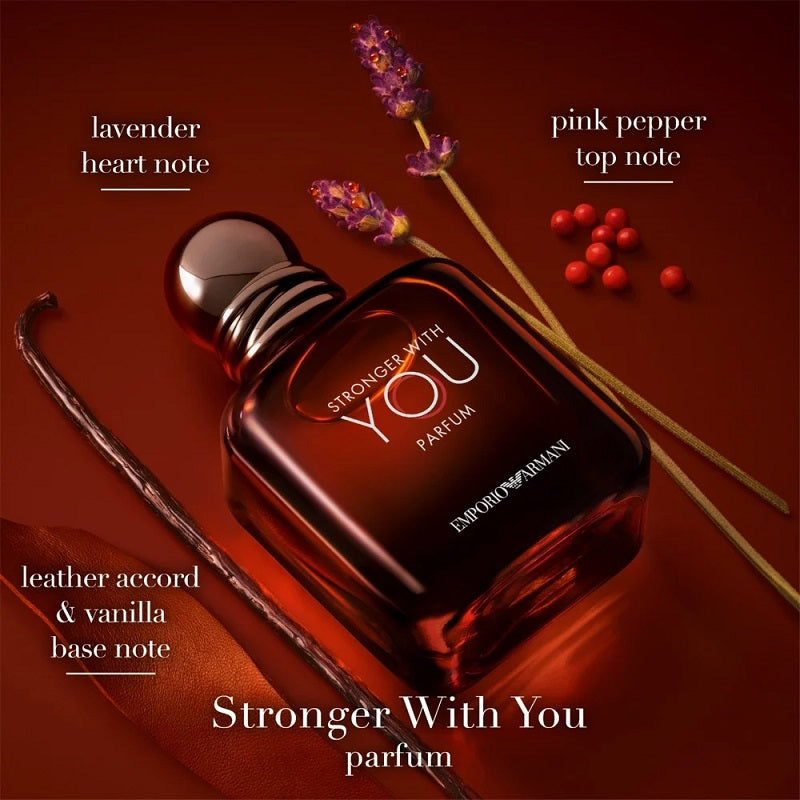 Emilio Pucci 'Stronger With You' perfume bottle with lavender and pink pepper elements on a red background
