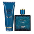 A set of Versace Eros cologne and matching body lotion, both in blue bottles with the Versace logo displayed prominently.