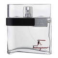 A 100ml bottle of F by Ferragamo Pour Homme eau de toilette, with a clear glass container and a black cap.