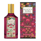 Gucci Flora perfume bottle and packaging with floral design on a white background