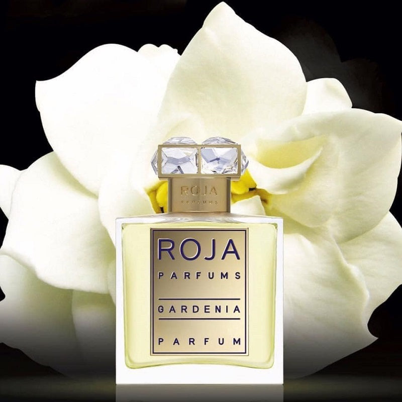 Roja Parfums Gardenia parfum bottle with white flowers in the background