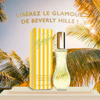 Perfume bottle and packaging with palm trees in the background