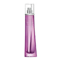 A purple glass bottle of 'Very Irresistible' Eau de Parfum by Givenchy with a silver cap.
