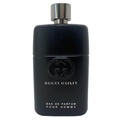 Black Gucci Guilty Eau de Parfum bottle on a white background