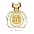 Guess perfume bottle with gold cap and decorative label on a white background