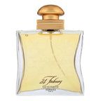 Hermes 24 Faubourg Eau de Parfum bottle with gold cap on a white background