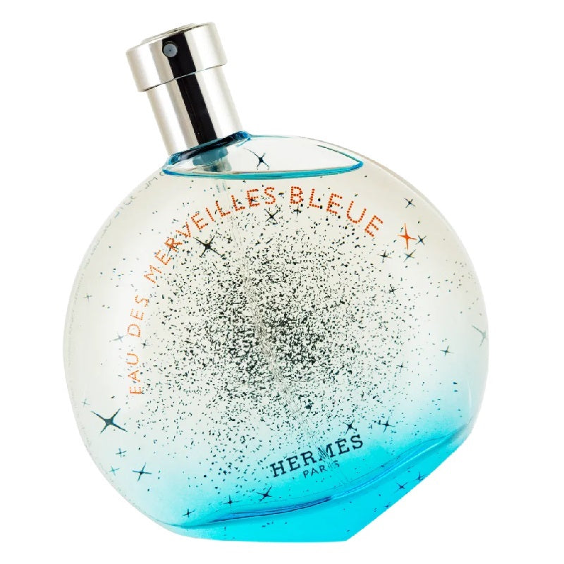 Hermes Eau Des Merveilles Bleue eau de toilette spray bottle, predominantly blue with white speckles and branding details.