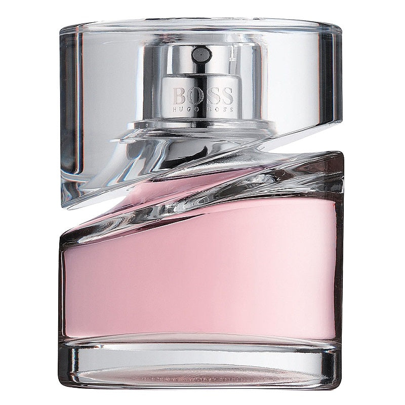 Pink perfume bottle with clear glass cap on a white background
