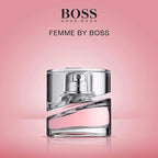 BOSS Femme by Hugo Boss perfume bottle on a pink background