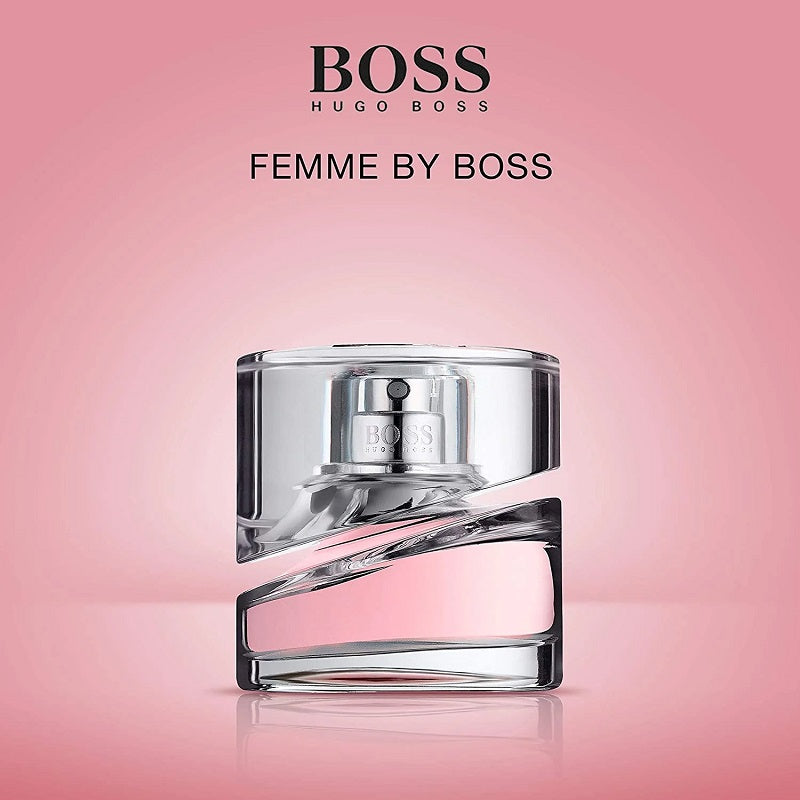 BOSS Femme by Hugo Boss perfume bottle on a pink background
